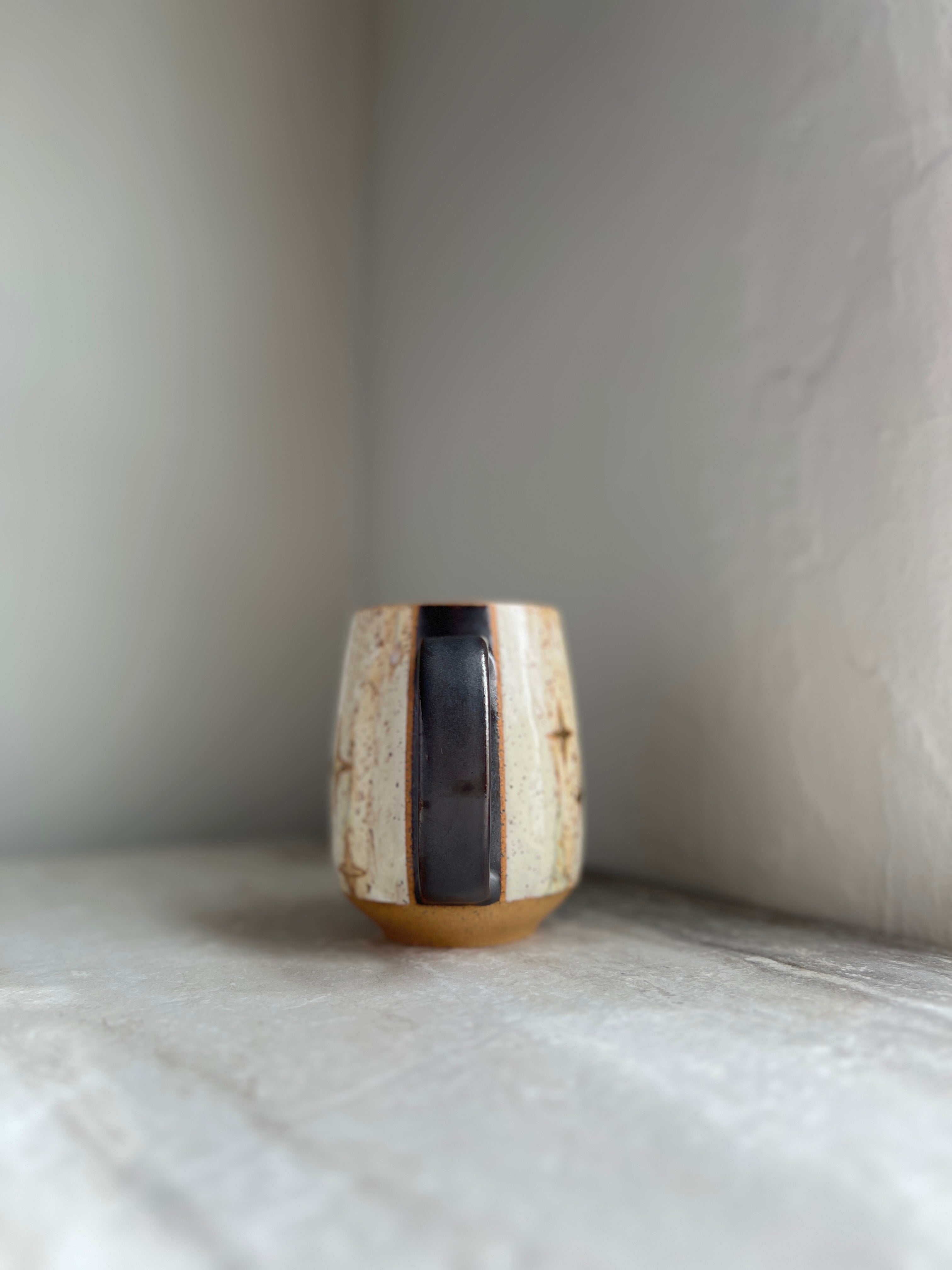 M12 mug